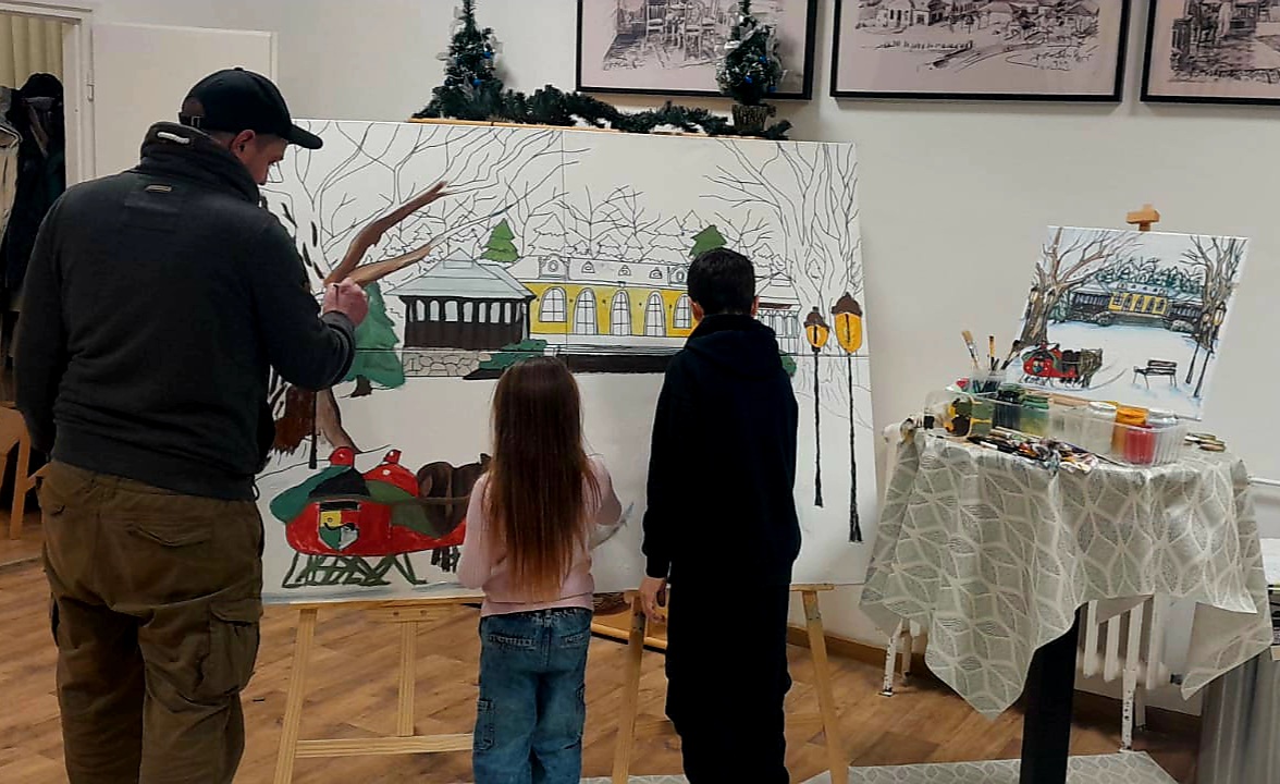 Készül az órásvászon kifestő - egy kép, sok ember közös munkája